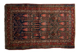 Vintage Kurdish Hamadan rug, garden of paradise design with abrash, navy and madder red.