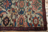 Antique Kurdish Bijar rug's nuanced Herati Mahimahi floral pattern and detailed border.