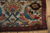 Worn Herati motif and burgundy border on an antique Kurdish Bijar rug corner.
