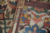 Antique Bijar rug's professional seam with detailed banded border.