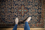 Vintage Dargezine rug with dark navy Herati design and central medallion.