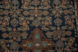 Vintage Dargezine rug showing central medallion detail and Herati design in navy, powder blue, copper.
