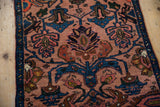 Close view of the even wool pile and intricate floral patterns of the Mehreban rug.
