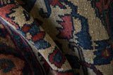 Hand-knotted pile of a vintage Lilihan rug displaying platinum, sapphire, and cochineal motifs.
