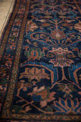 Vintage Lilihan runner's dark navy field with copper, forest green, blush tree-of-life and intricate vines.