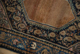 Traditional Persian Hamadan rug with sand medallion, navy field, dusty rose botehs.