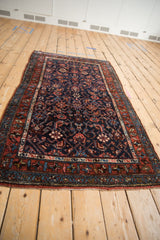 Vintage Kurdish Hamadan rug corner, geometric Herati motif in navy, madder root red, sky blue.