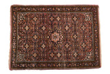 Vintage Hamadan rug with starburst medallion, Herati pattern, dusty red and navy colors, 3'7