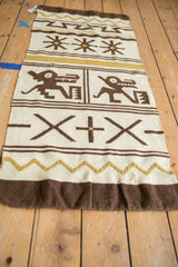 Vintage Moroccan Kilim with brown pictorial animals, geometric crosses, and dusty gold lines.