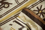 Corner detail of vintage Moroccan Kilim with ivory, dusty gold zig-zag, and intact side selvage.