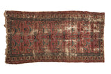 Vintage hand-knotted Persian Mehreban rug with worn texture, sprawling arabesques, plum, teal, ivory.