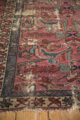 Worn pile and exposed foundation on vintage Mehreban rug with dusty plum, teal border.