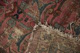 Vintage Mehreban rug showing worn, dusty plum pile, tattered fringe, and woven foundation.