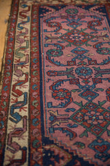 Vintage Mehreban rug, interconnected serpent motif on ivory border with violet, green.