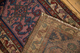 Vintage Mehreban rug's hand-knotted reverse, showing the woven foundation and intricate pattern.