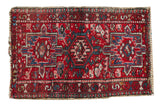 Vintage Karaja rug with serrated triple medallions and geometric floral blossoms, cherry red field. 1'11