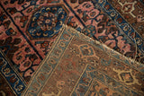 Vintage Lilihan rug's tightly woven reverse, showcasing geometric patterns and tattered fringe.