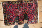 Cherry red field of vintage Lilihan rug with classic floral sprays and bouquets.