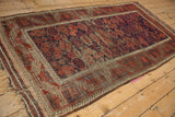 Antique Belouch runner end: tattered flatweave, exposed foundation, red and blue border.
