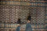 Persian Hamadan rug, circa 1920s, with allover navy boteh pattern and worn pile.