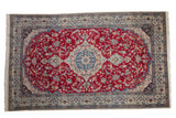Vintage Nain carpet with a central medallion, cherry red field with scrolling vines, and birds.