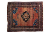 Antique Afshar rug featuring a stepped roundel medallion, plant spandrels, and abrashed madder and sapphire tones, 4'5