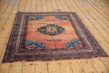 Corner of an antique Afshar rug, displaying multi-layered borders and a sapphire blue spandrel.