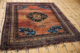 Antique Afshar rug corner with sapphire blue serrated plant motif and geometric borders.