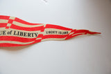 Tapered end of the vintage felt pennant showing red stripes and 