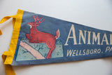 Red deer graphic, dusty blue felt, and yellow binding detail on vintage pennant.