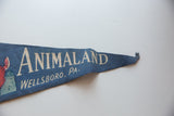Pointed tip of blue felt flag with white 