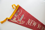 Vintage New York City felt pennant, yellow trim, Statue of Liberty and Coliseum graphics.