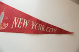 Cream 'YORK CITY' lettering on a vintage red felt pennant.