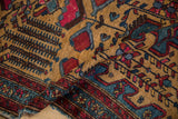 Low wool pile and visible knot heads on a vintage hand-knotted Mehreban rug.