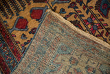 Close-up of the vintage Mehreban rug's corner, revealing the intricate hand-knotted foundation.