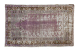 Vintage Distressed Oushak rug, pale aubergine prayer motif, with time-softened bronze and silver.