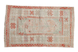 Distressed Oushak rug with faded central plant, ivory, sea foam green, and orange borders, 2'1