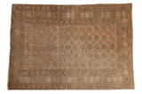 Vintage distressed Afghani Bokhara rug, allover gul pattern in pale brown and ivory, 4'3