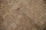 Distressed Afghani Bokhara rug pile, hand-knotted back, and fringe with elephant gul pattern.