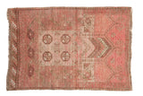 Distressed vintage Daulatabad prayer rug in blush and camel tones, elephant footprint design.
