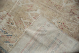 Worn pile of vintage Kayseri rug revealing hand knotted foundation and machine bound edge.