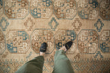 Ersari carpet, worn geometric panels of sand, coffee brown, and dusty blue guls.