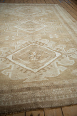 Distressed vintage Oushak carpet showcasing geometric medallion, primitive outlines, and subtle abrashes.