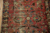 Worn field, exposed foundation, and faded palmettes of vintage Lilihan rug with serpent border.