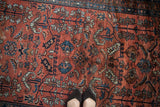 Vintage Hamadan rug with expressive sapphire blue and madder root rust serrated patterns.