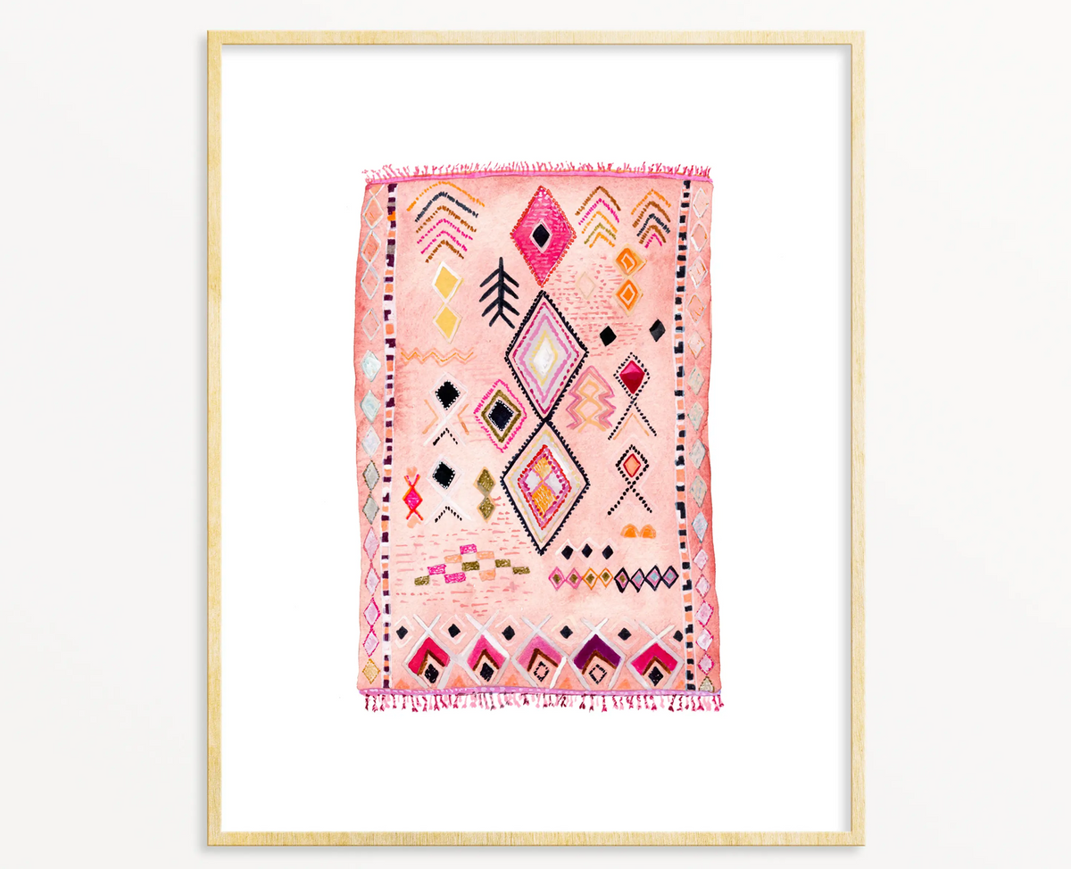 Framed Snoogs & Wilde Art Rug print, pink watercolor with geometric diamond motifs.