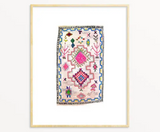 A Snoogs & Wilde watercolor art print of a geometric rug with vibrant pink, blue, and yellow motifs.