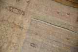 Distressed Oushak runner showing worn pile, hand-knotted foundation, and intact selvage.