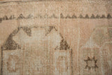 Distressed Kurd rug detail, showing worn pile, foundation, and geometric guls.