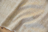 Beige foundation and worn knot heads on the reverse of this vintage Oushak runner.